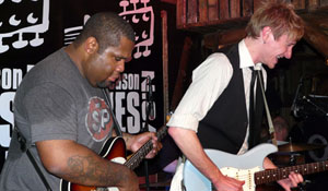 Kirk Fletcher and Adam Douglas is palying during Dark Season Blues 2009 at Kroa in Longyearbyen, Svalbard